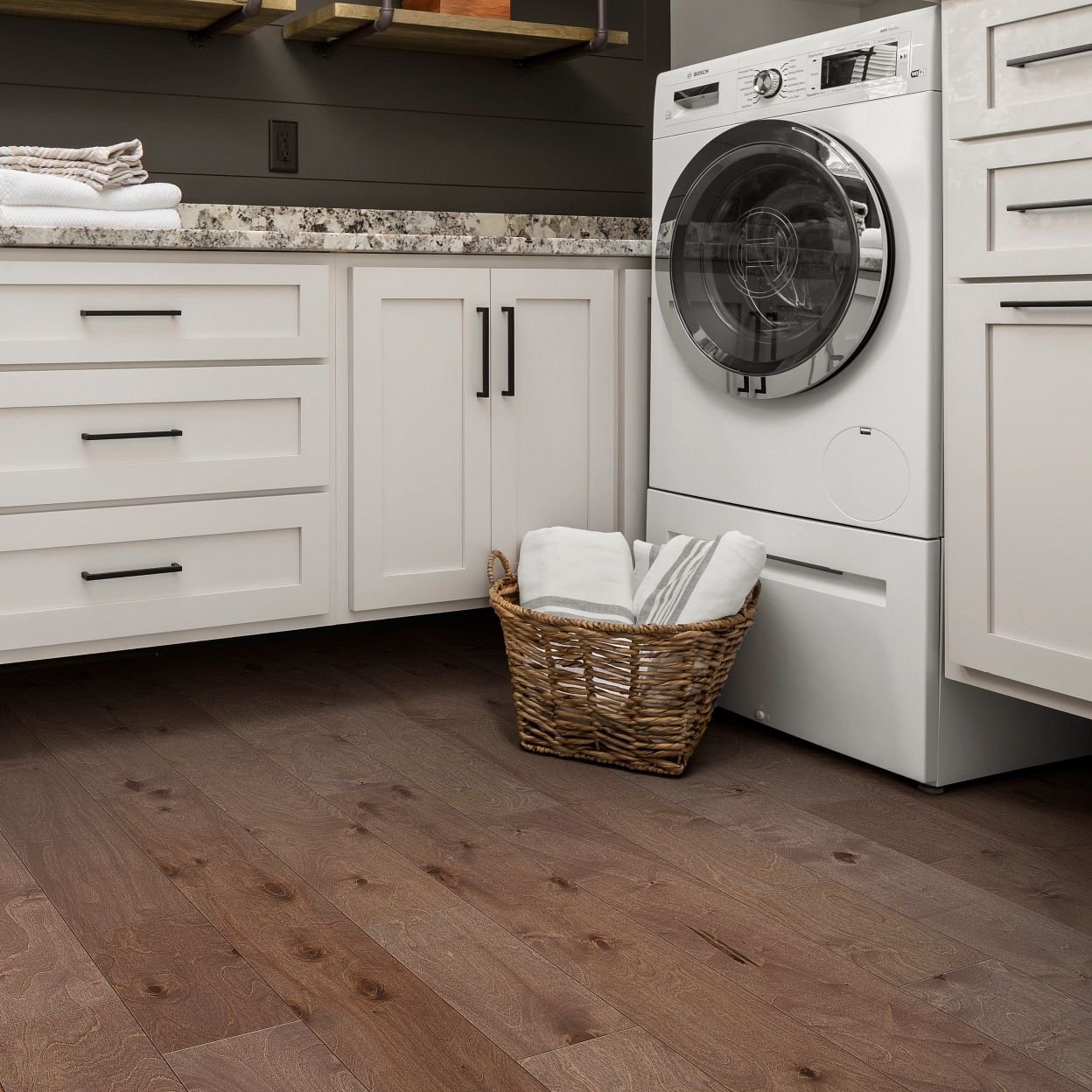 laundry room on hardwood floor