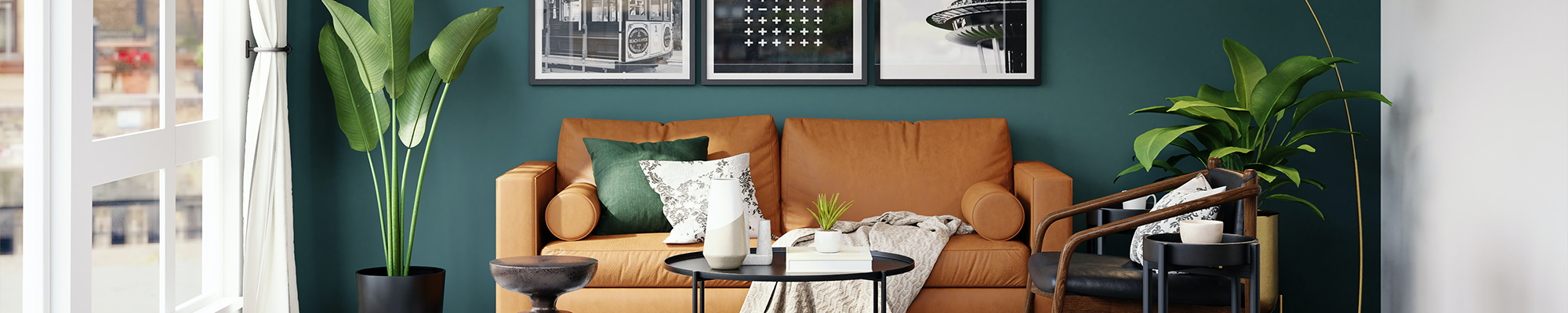 brown leather couch in living room with green walls