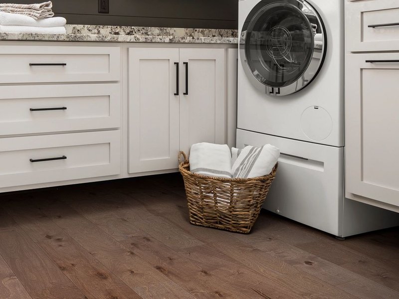 laundry room on hardwood floor